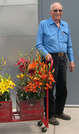 Hugh with wagon full of lilies